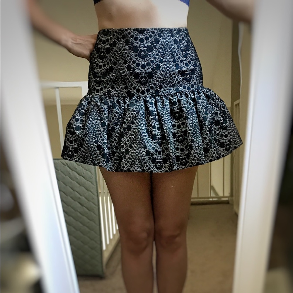 Flirty flared lace mini skirt